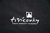 Logo na temně modrém tričku Tisícovky.