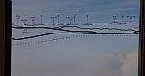 Panoramatické schema na vyhlídkovém ochozu Pradědského vysílače. Ač byla viditelnost místy vynikající, vše je ukryto pod mraky.