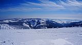 Výhledy z vrcholu Kralického Sněžníku směrem k jihu. Jeden z prvních kalendářních jarních dnů roku 2013.