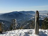 Skupina beskydských tisícovek z vrcholu Lysé hory: Malý Smrk, Smrk, Malá Stolová, Kněhyně, Velká Stolová, Radegast a Radhošť.