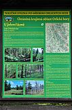 Informační panel NS "Po hřebeni Orlických hor" věnovaný lesům se nachází poblíž PR Jelení lázeň mezi tisícovkami Malá Deštná a Velká Dešná.