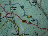 Detail turistické mapky s jasně viditelnými vrcholy tisícovek Ždánov, Ždánov - JV vrchol, Svatý Jan a Svatý Jan - V vrchol.
