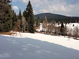 Žlíbský vrch - pohled z lyžařské sjezdovky v Kořenném.
